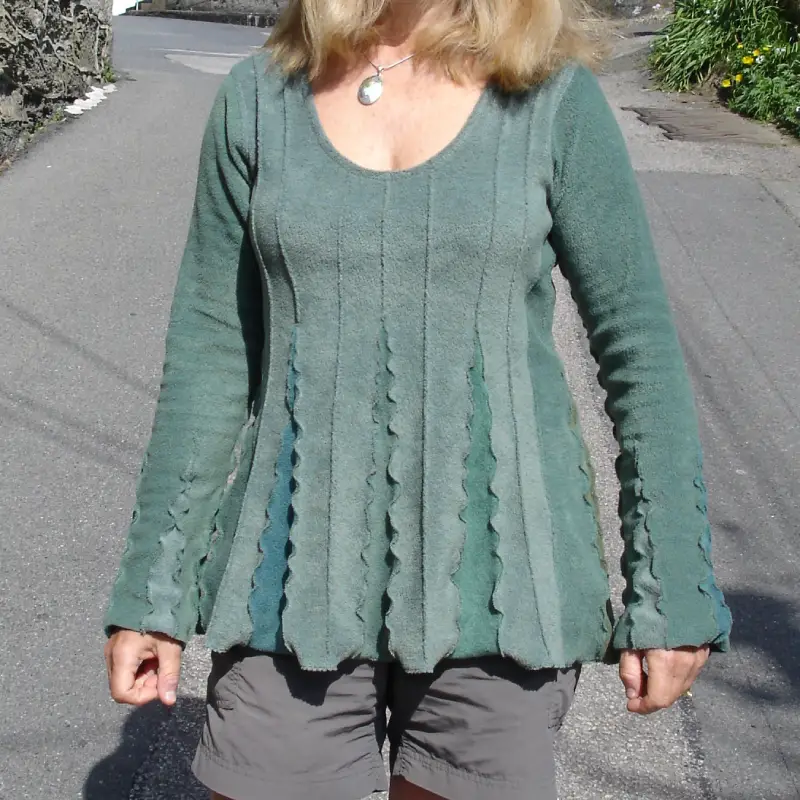 Feeline Clothing top, in aqua colour way, modelled outside Salt Cellar Workshops, Porthleven, Cornwall